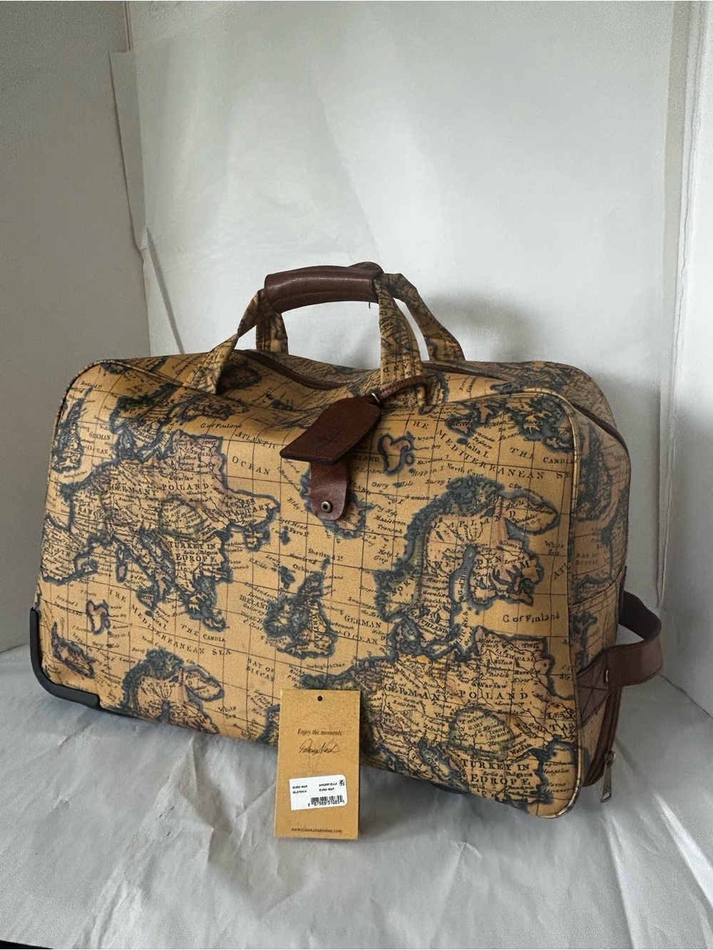 Patricia Nash Map-Print Duffel/Trolley  in Tan and Brown Leather Trim